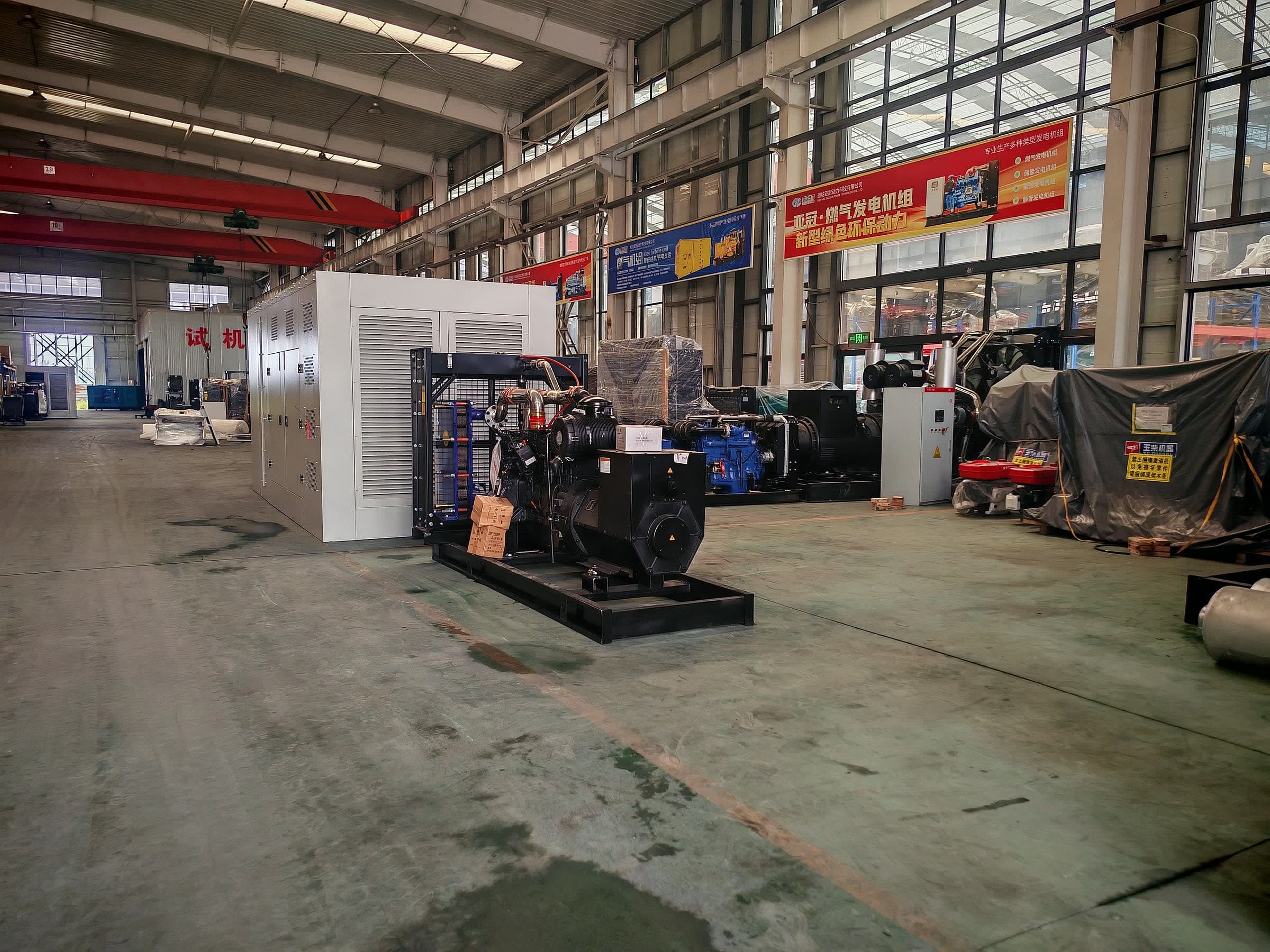 Sets in the commissioning area: engines coupled, control cabinets wired, load cells being checked