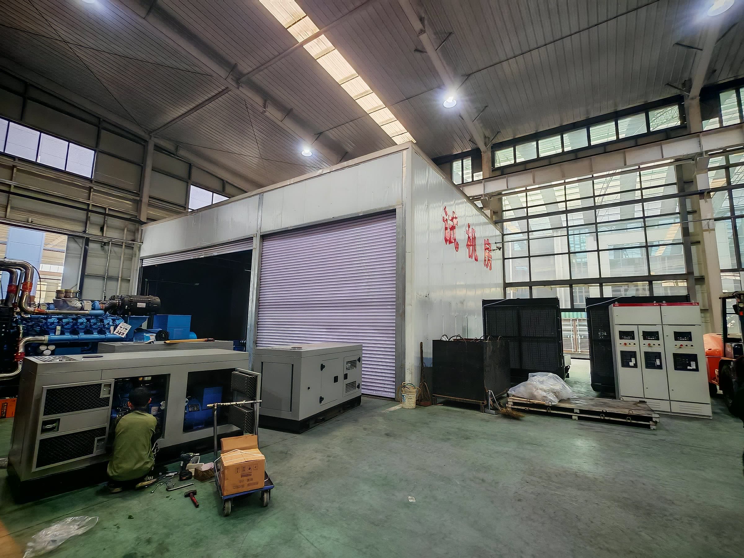 The test room: sets with control cabinets connected, ready for load-bank running